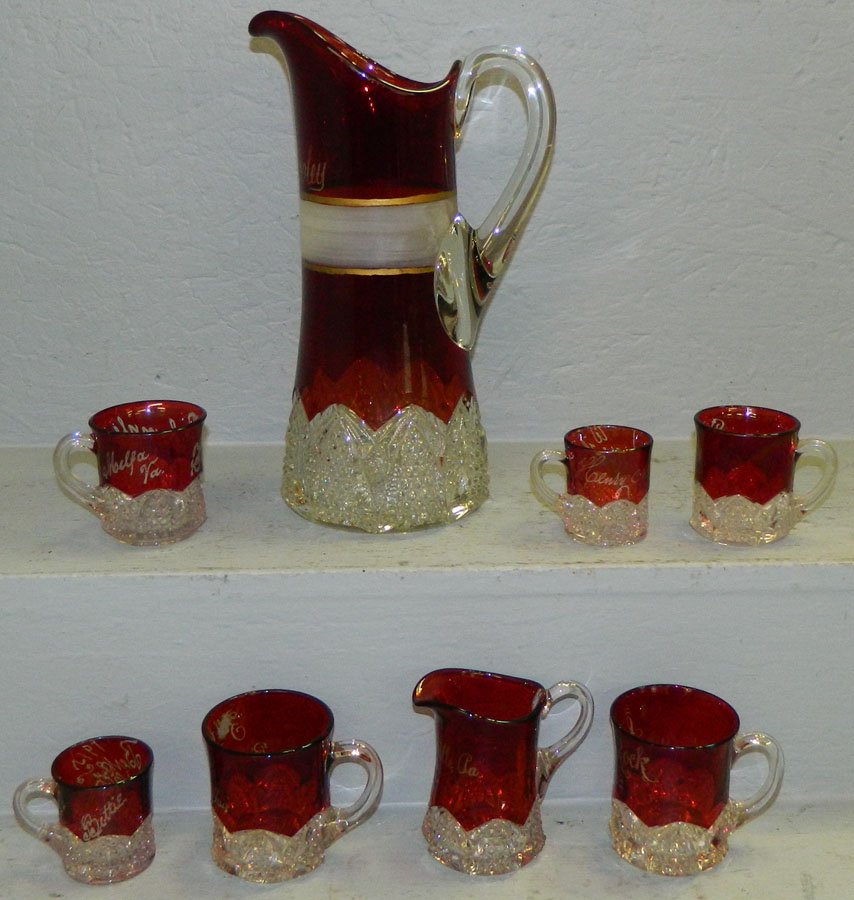 8 pc. Souvenir patt. Ruby lead glass Pitcher set. (1 of 3)