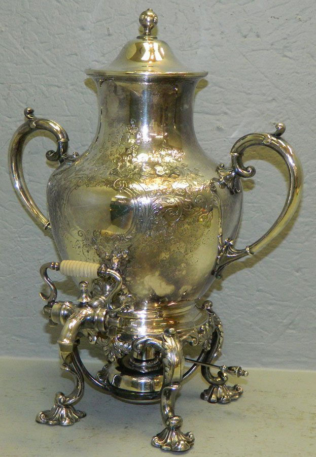 Silver plate tea urn. 15" tall. (1 of 1)