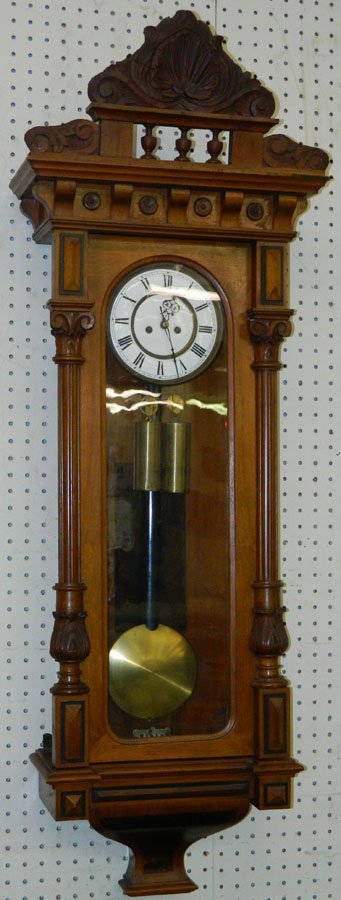 Hanging Viennese wall clock. 15" x 50". (1 of 2)