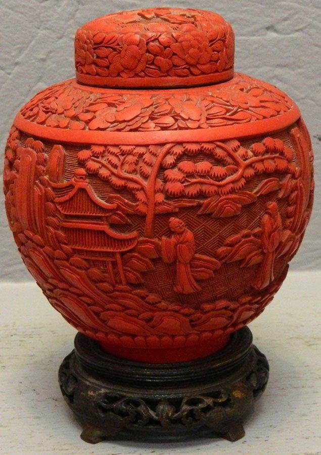 Carved cinnabar ginger jar with stand. 6" tall. (1 of 3)