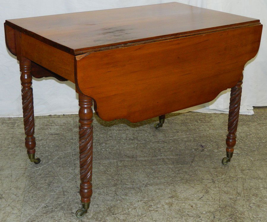 Am cherry shaped top carved leg Pembroke table. (1 of 2)
