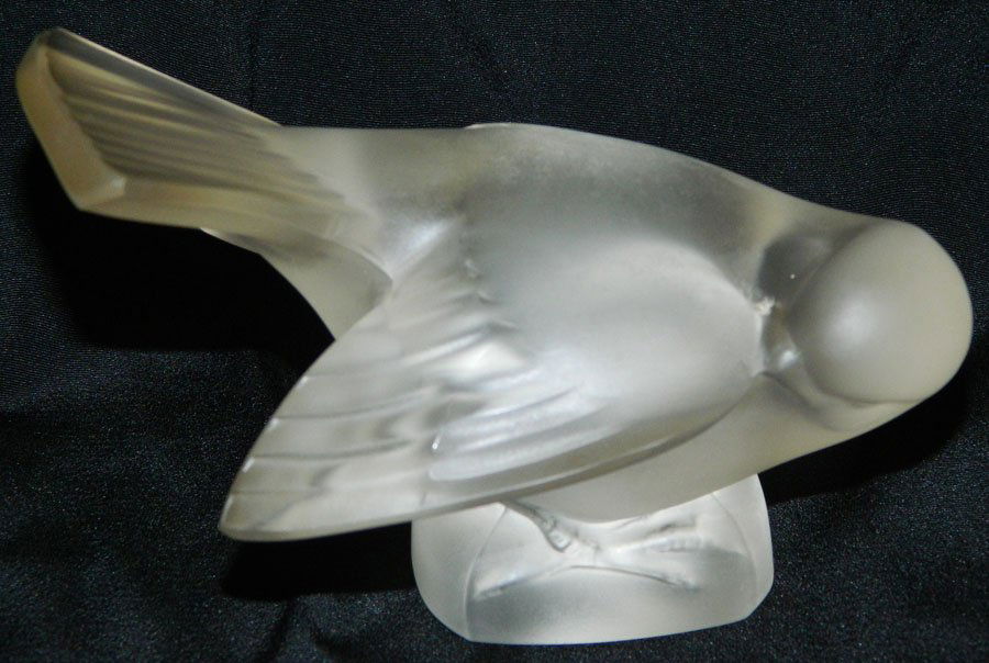 Signed Lalique dove on nest. 3 1/4" tall. (1 of 2)