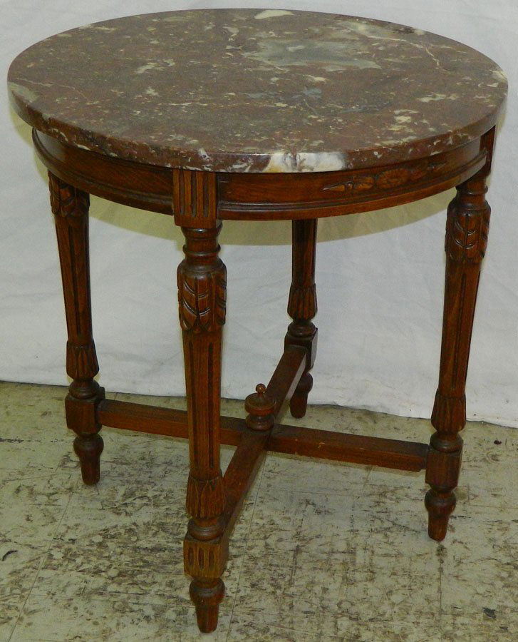 Round marble top French table. (1 of 2)