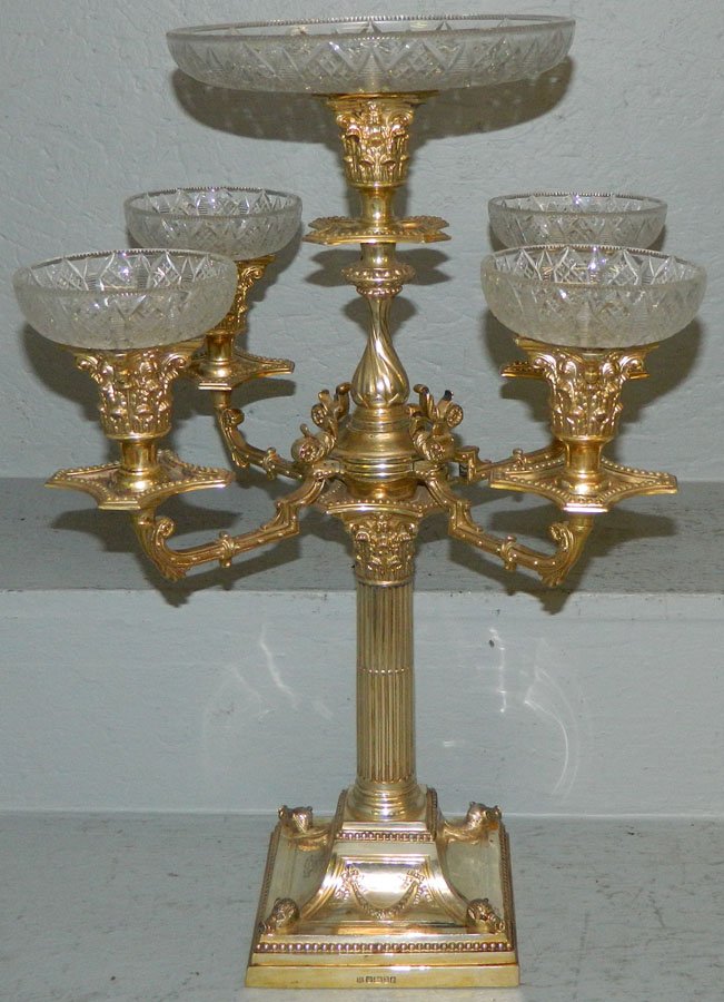 19th C. Eng sterl hallmarked epergne w/ orig bowls.: 19th C. English sterling hallmarked epergne w/ original bowls. 19 3/4" tall. 16" spread.