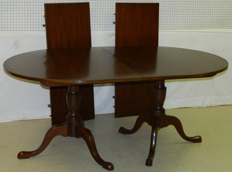 Kittinger double pedestal Queen Anne table: Kittinger double pedestal Queen Anne dining table. 106"total x 45" x 29".
