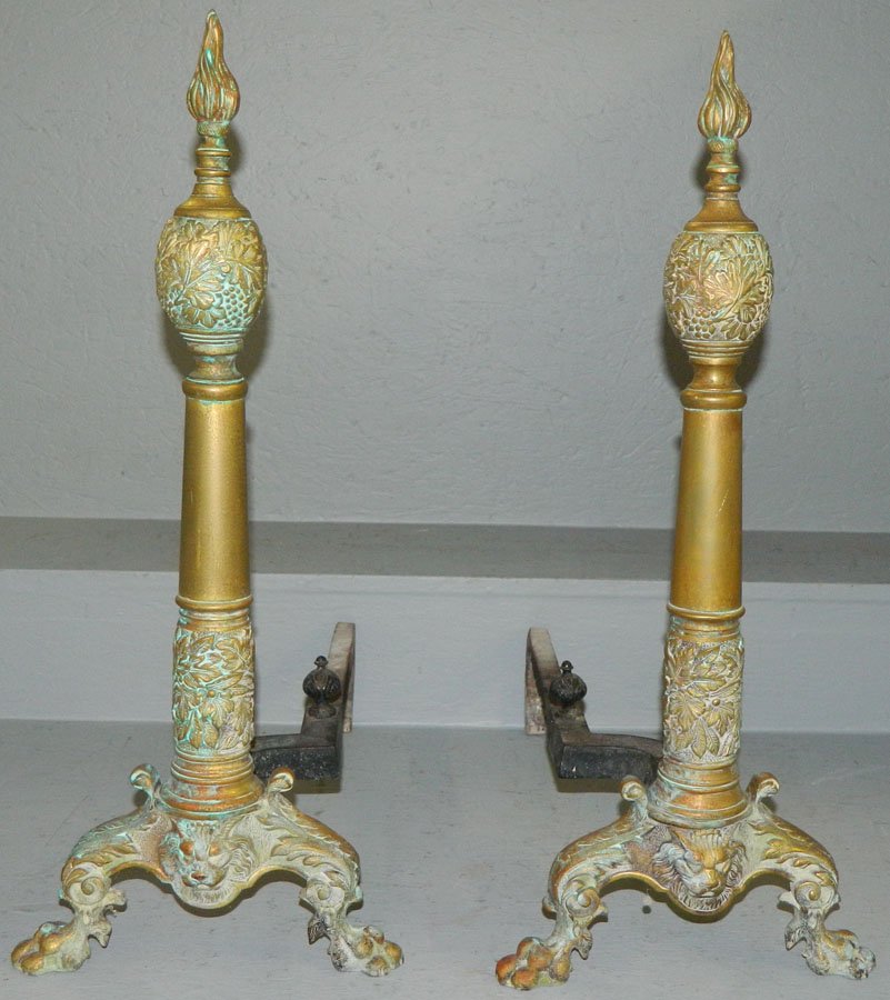 Pair of claw foot brass French andirons: Pair of claw foot brass French andirons. 23 1/2" tall.
