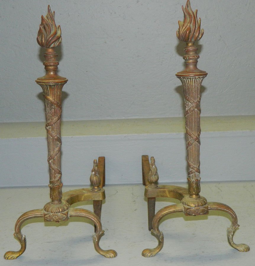 Pair of brass andirons: Pair of brass andirons. 20" tall.