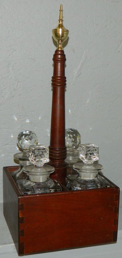 4 bottle Tantalus set with dovetail case. (1 of 2)