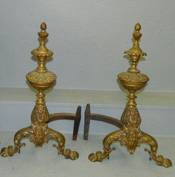 Pr. French brass andirons w/ Man 'O War face. (1 of 1)