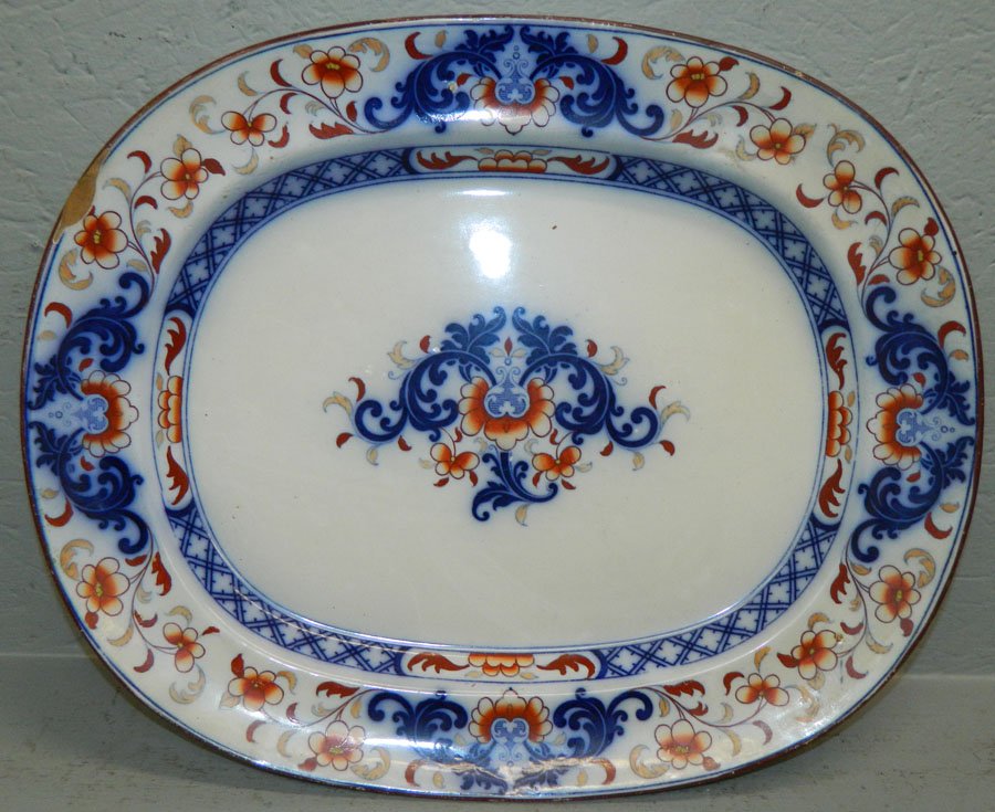Flow blue Ironstone type platter.: Flow blue Ironstone type platter. 19" long