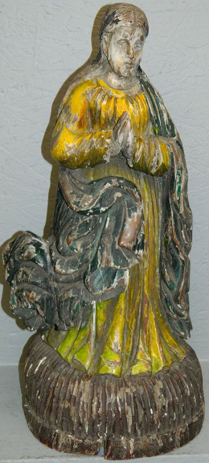 Carved Santos figure.. (1 of 3)