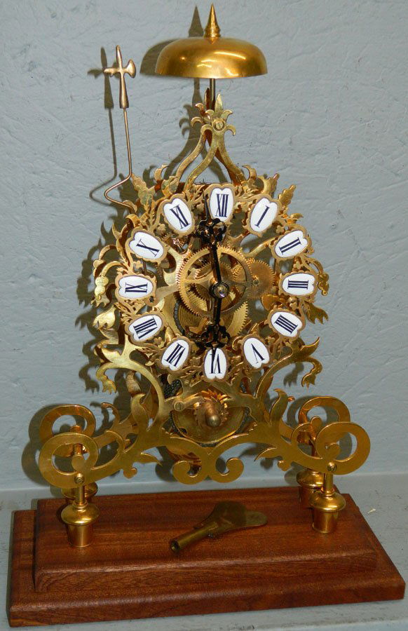 Brass skeleton clock with fuzee movement.