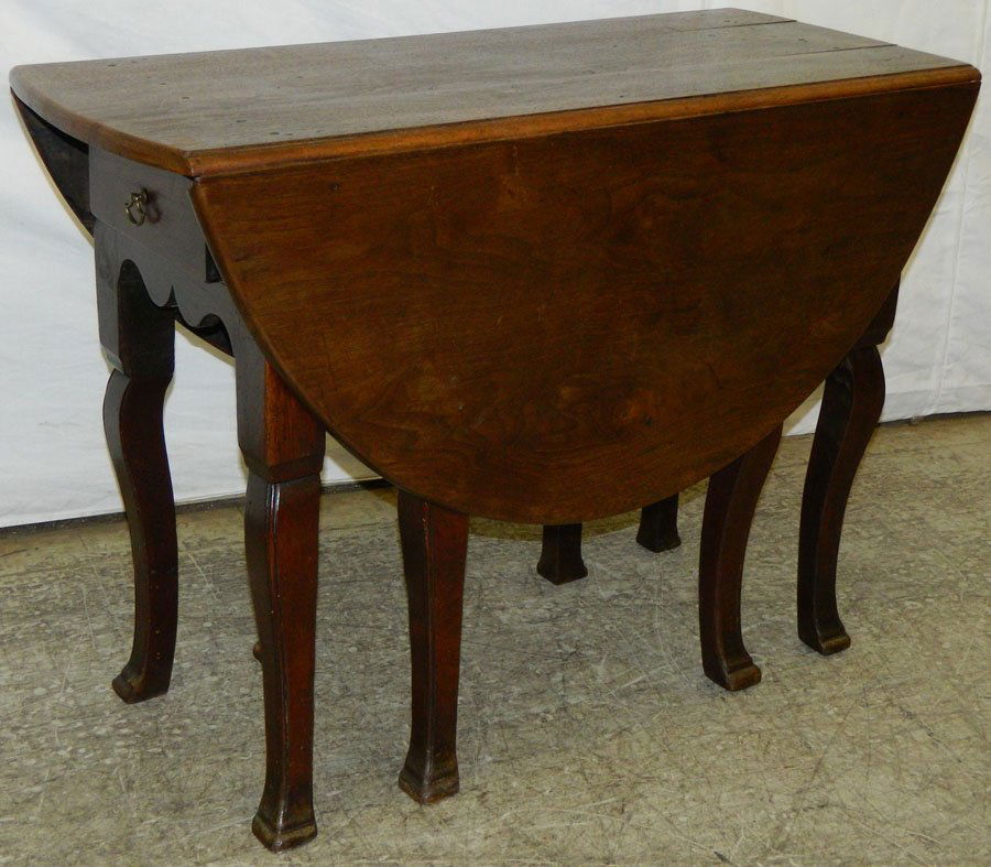 19th C. French walnut eight leg drop leaf table. (1 of 2)