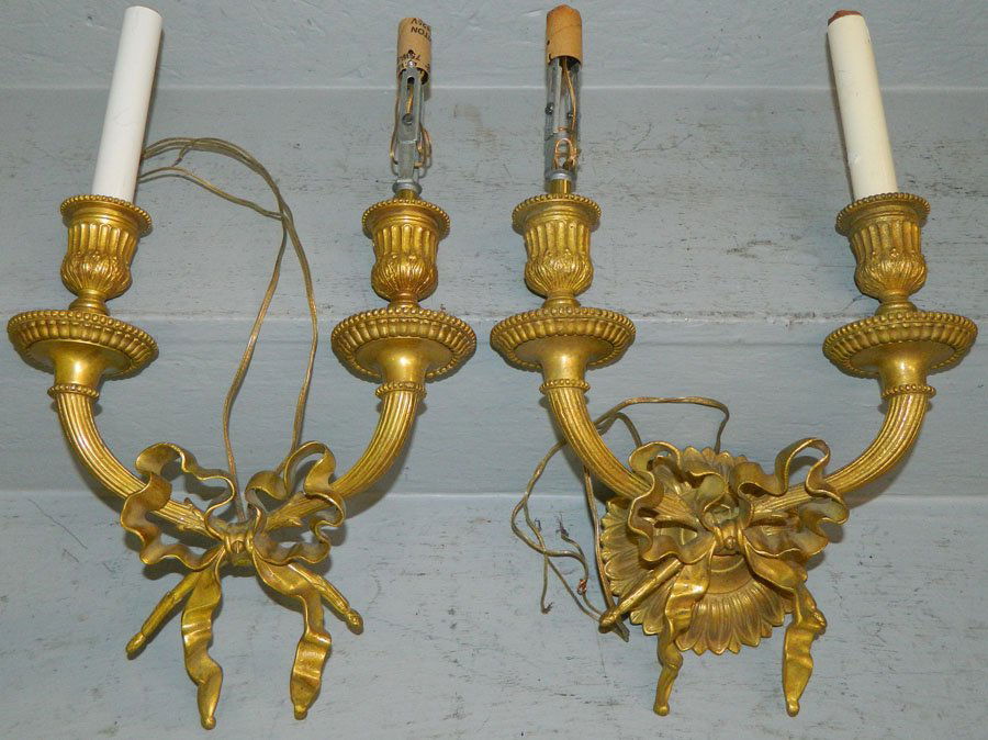 Pair of brass wall sconces: Pair of brass wall sconces. 16" long.