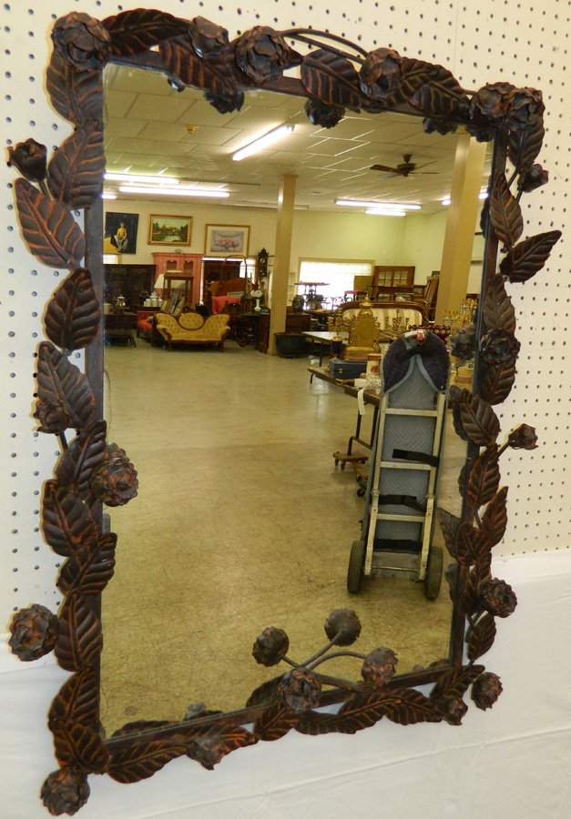 Metal tramp art type mirror.: Metal tramp art type mirror. 39" x 28 1/2".