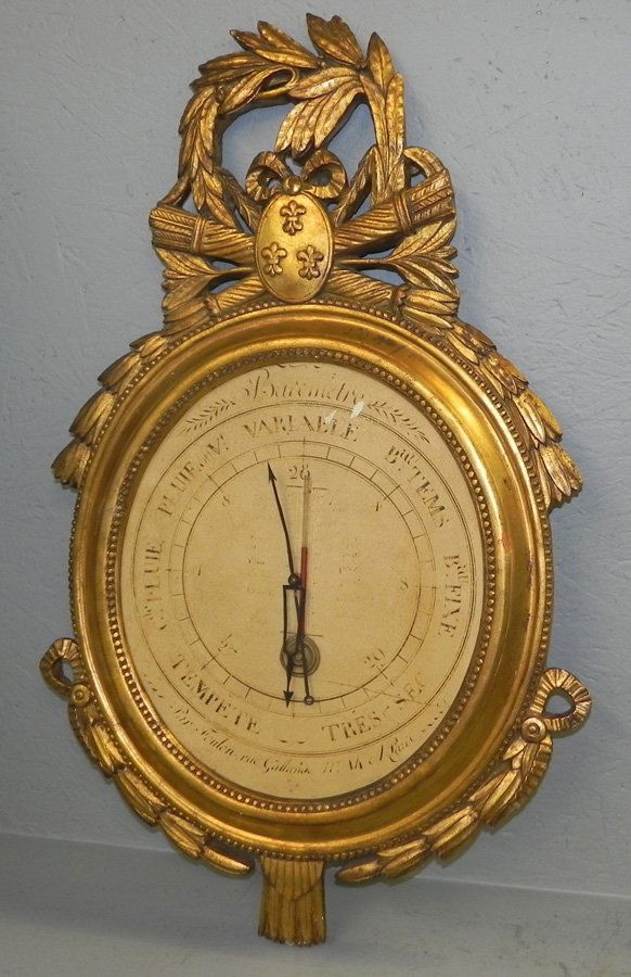 Decorative gilt barometer. 31 1/2" tall. (1 of 2)