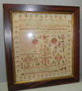 Beautiful 19th C sampler dated 1845. 24" x 26".