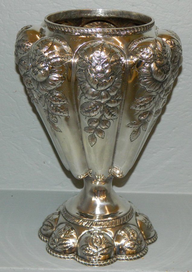 Silver on copper Repousse footed vase: Silver on copper Repousse style footed vase. 11 7/8" tall.