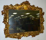 Gold leaf carved Della Robbia style framed mirror