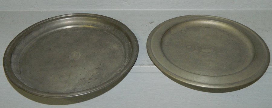 2 pewter plates. 10 12" to 11 1/2" dia. (1 of 2)