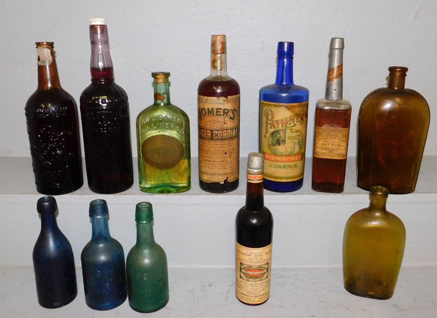 Collection of 13 early bottles. To 15" tall. (1 of 1)
