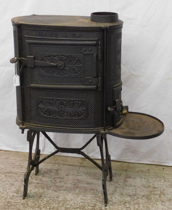 Hayes & Co. cast iron heater with stand. 30" tall. (1 of 3)