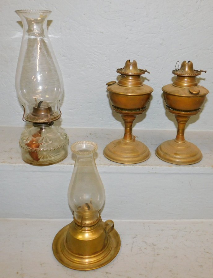 Pair brass oil lamps, finger lamp and glass oil lamp.: Pair brass oil lamps, finger lamp and glass oil lamp. Tallest 9 1/2" tall.