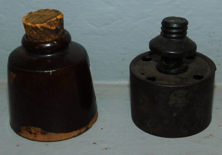 Early cast iron inkwell and stoneware ink bottle. (1 of 1)