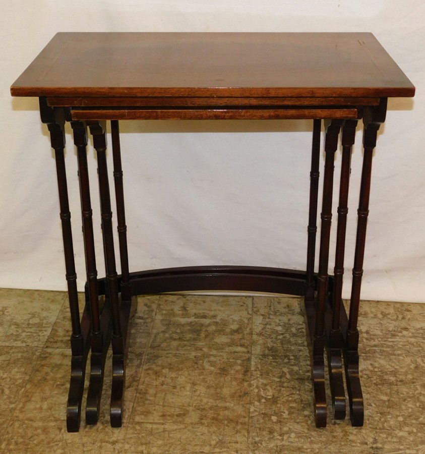 Set of inlaid mahogany nesting tables.: Set of inlaid mahogany nesting tables. 18 1/4" x 14" to 25 1/4" x 15 1/4".