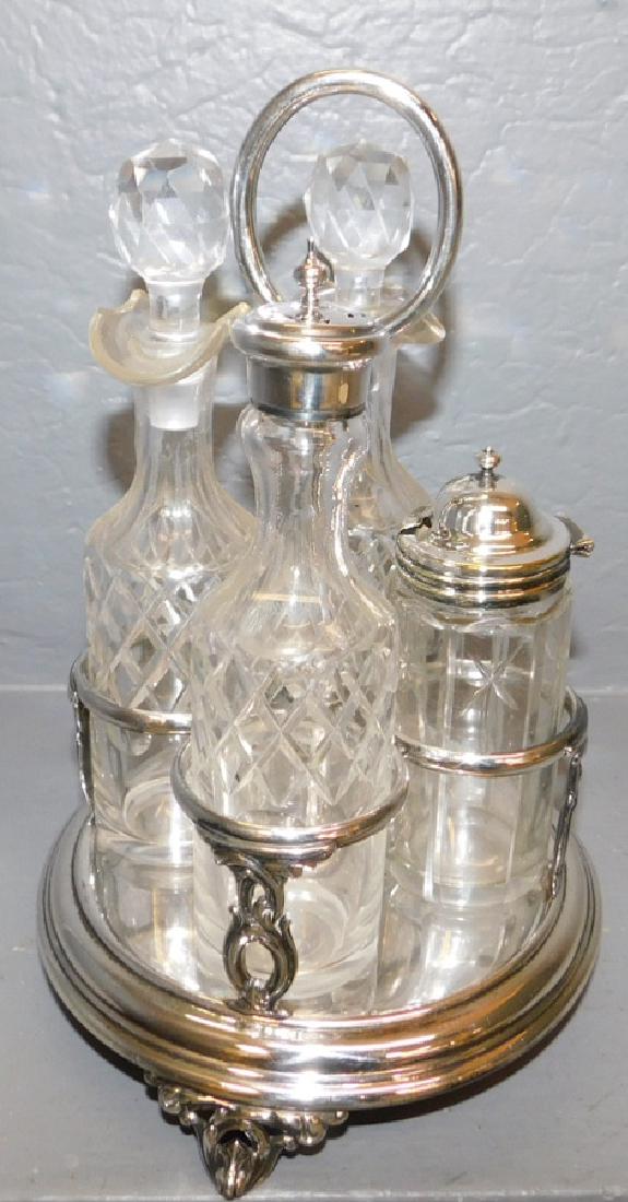 4 bottle Victorian silver plate cruet set. 10" tall. (1 of 4)