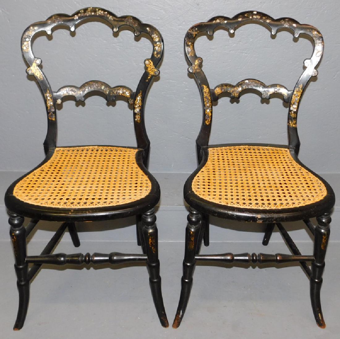 2 Black lacquer and MOP inlaid cane seat chairs. (1 of 2)