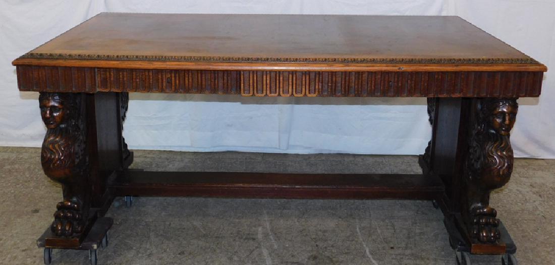 Allegorical female figural carved walnut library table. (1 of 4)