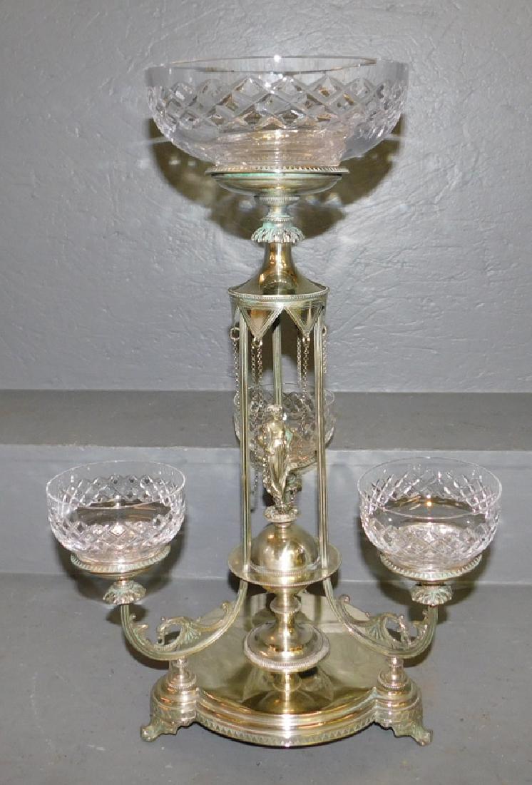 3 arm figural silver plate epergne.: 3 arm figural silver plate epergne. 20" tall x 13 1/2" spread.