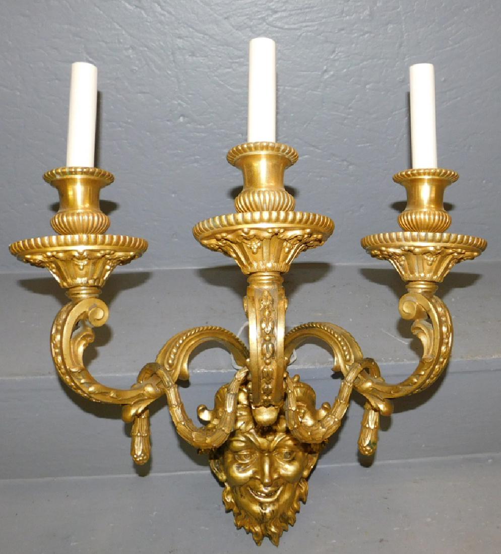Heavy cast brass Bacchus 3 light wall sconce. (1 of 2)