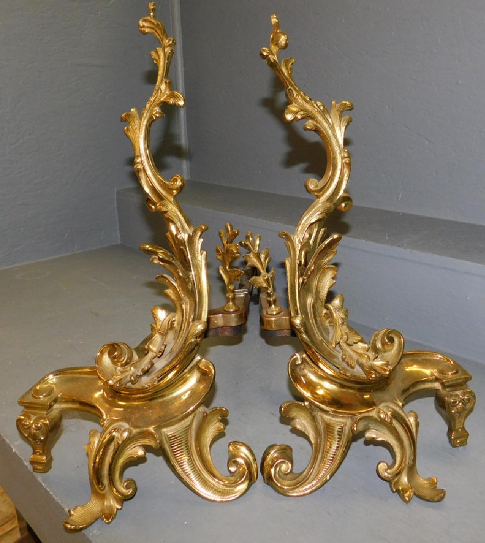 Pair of brass openwork French andirons. 19" tall. (1 of 2)