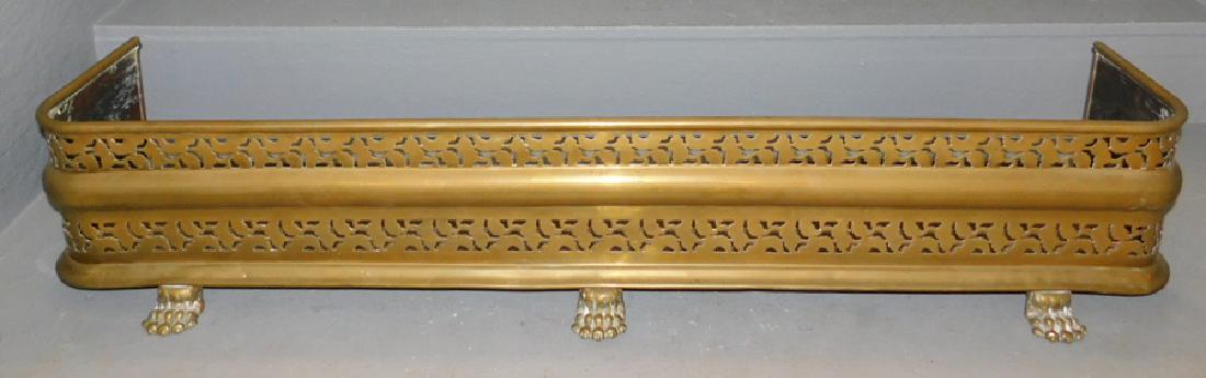 Openwork brass footed fire fender. 44" long. (1 of 1)