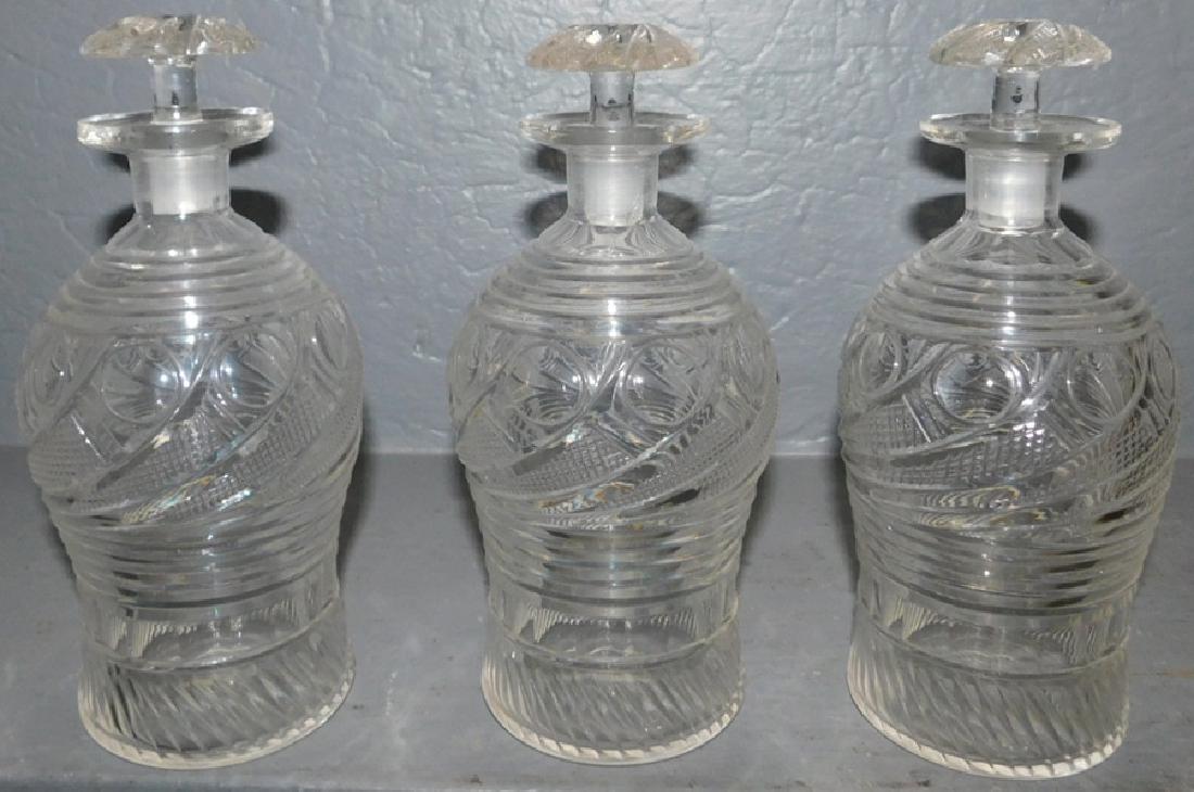 3 19th C blown and cut decanters. 8" tall. (1 of 2)