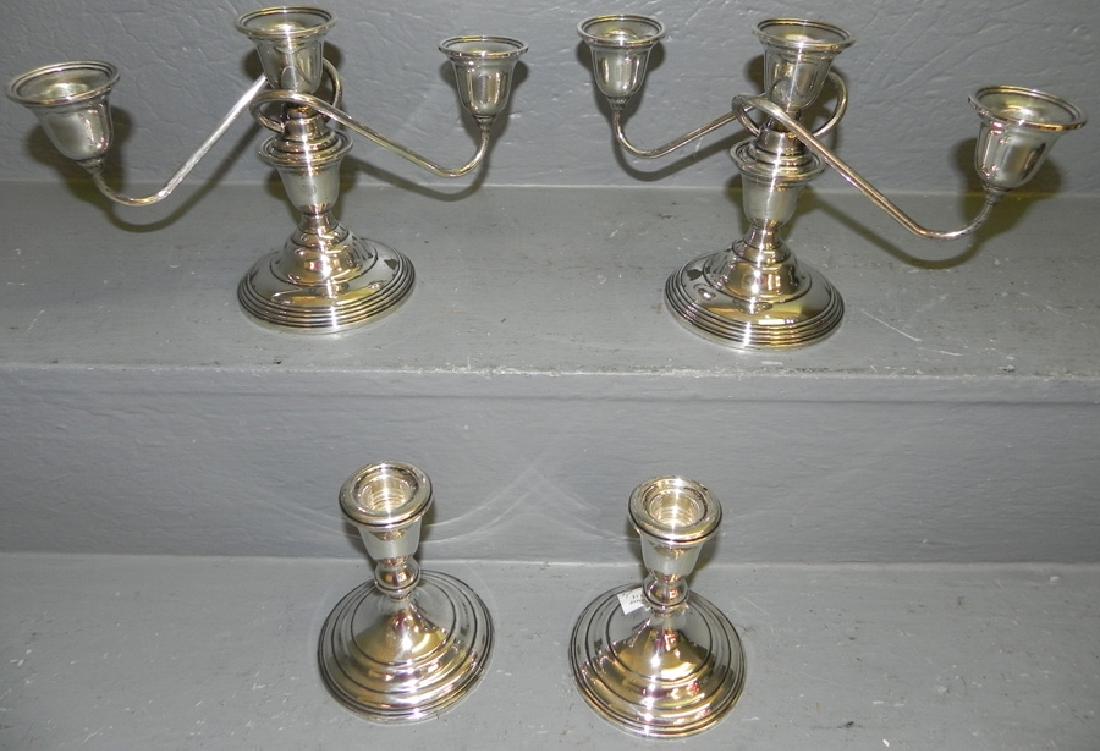 2 Pair Weighted sterling c/sticks and candelabras. (1 of 2)