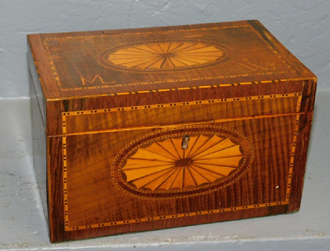 Oblong fan and monogram inlaid fitted tea caddy. (1 of 4)