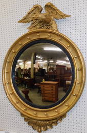 Large 19th C gilt spread bulls eye garniture mirror.