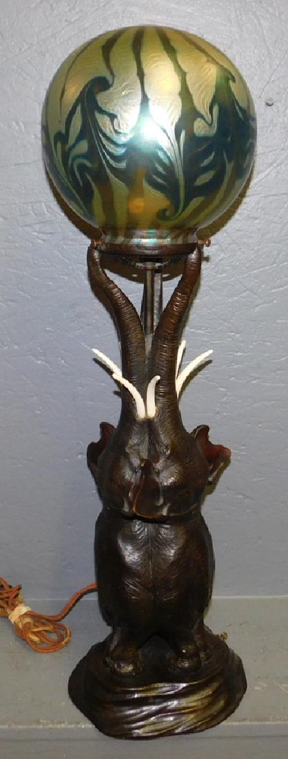 Bronze elephant lamp with Art glass shade. 28" tall. (1 of 3)