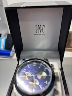 Men's Fashion Watch: I.N.C International Concepts silver with blue faceKeeps perfect time has additional clips for band