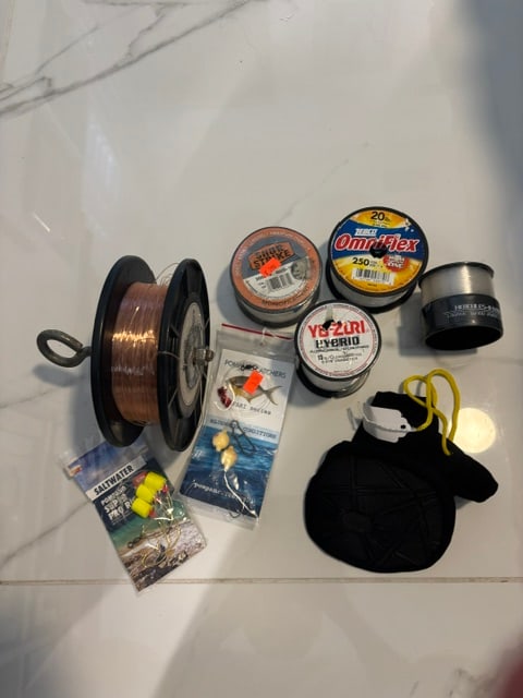 Lot of Fishing supplies: Fishing Lines most not opened, Unopened packages of Hooks