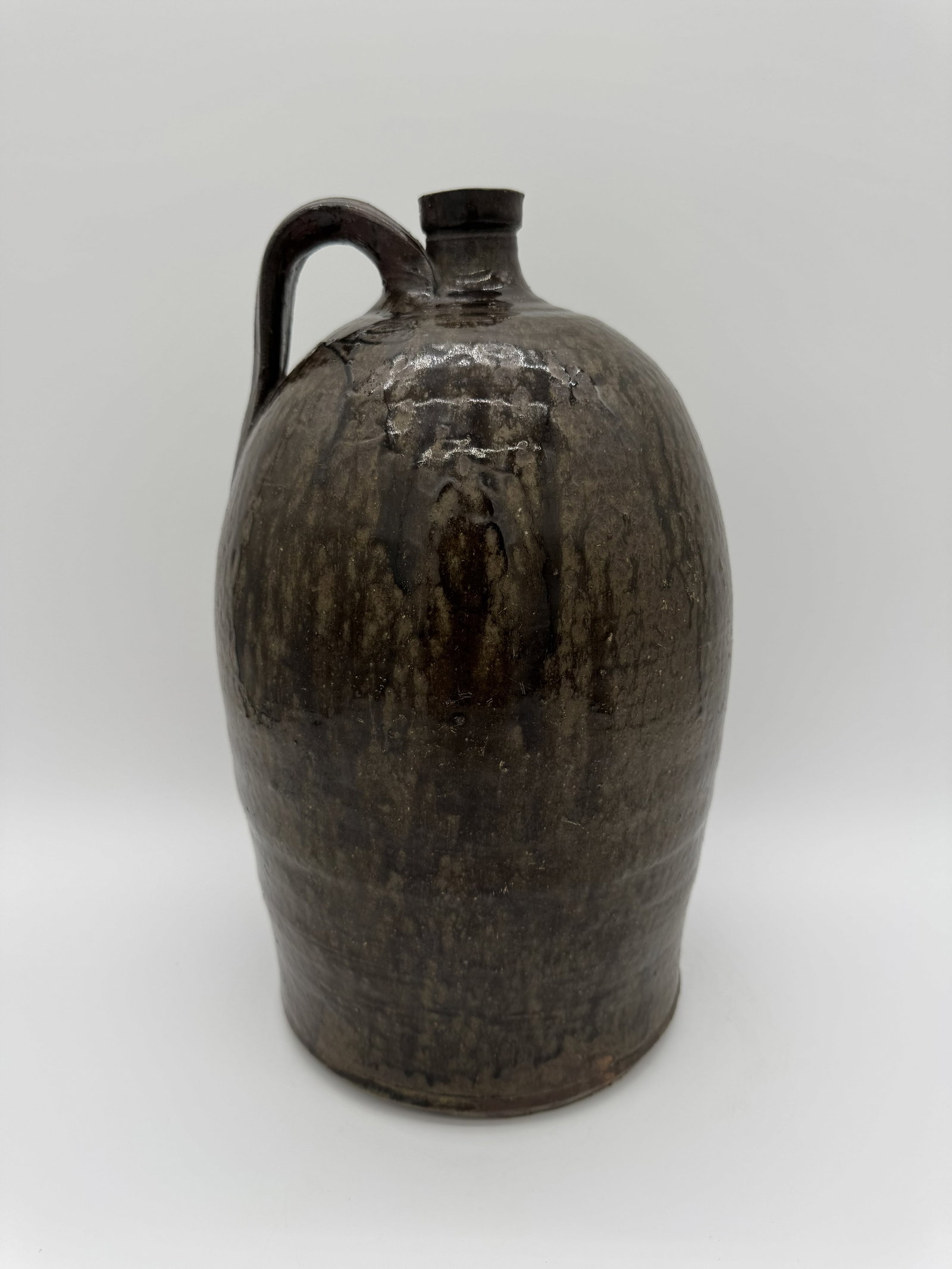 Dorsey 2 Gallon Jug: An early two-gallon molasses jug by a member of the Dorsey family from North Georgia. This gorgeous example is as good as it gets. Perfect in every way!!