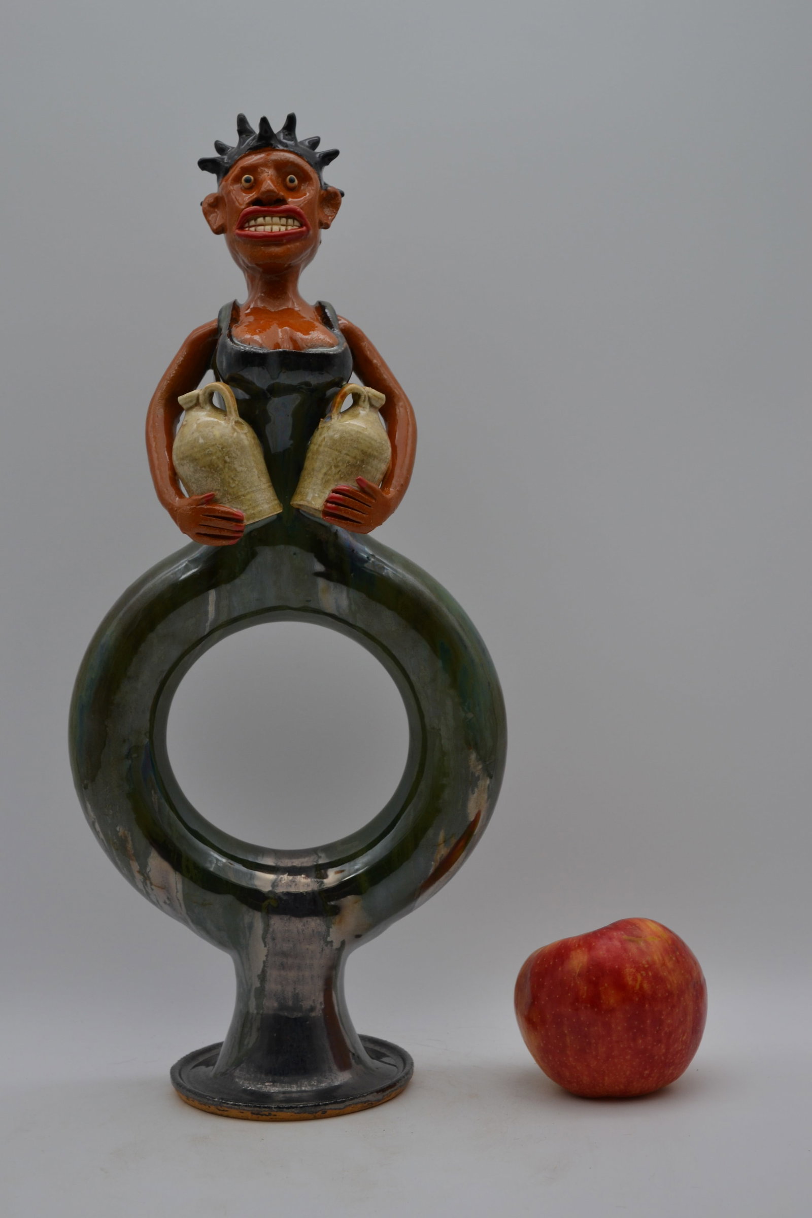 Marvin Bailey Ring Jug And Figural: An amazing ring jug by Marvin Bailey. This remarkable piece features a female figure formed into the top of the ring jug, creating a highly distinctive design. The craftsmanship throughout is