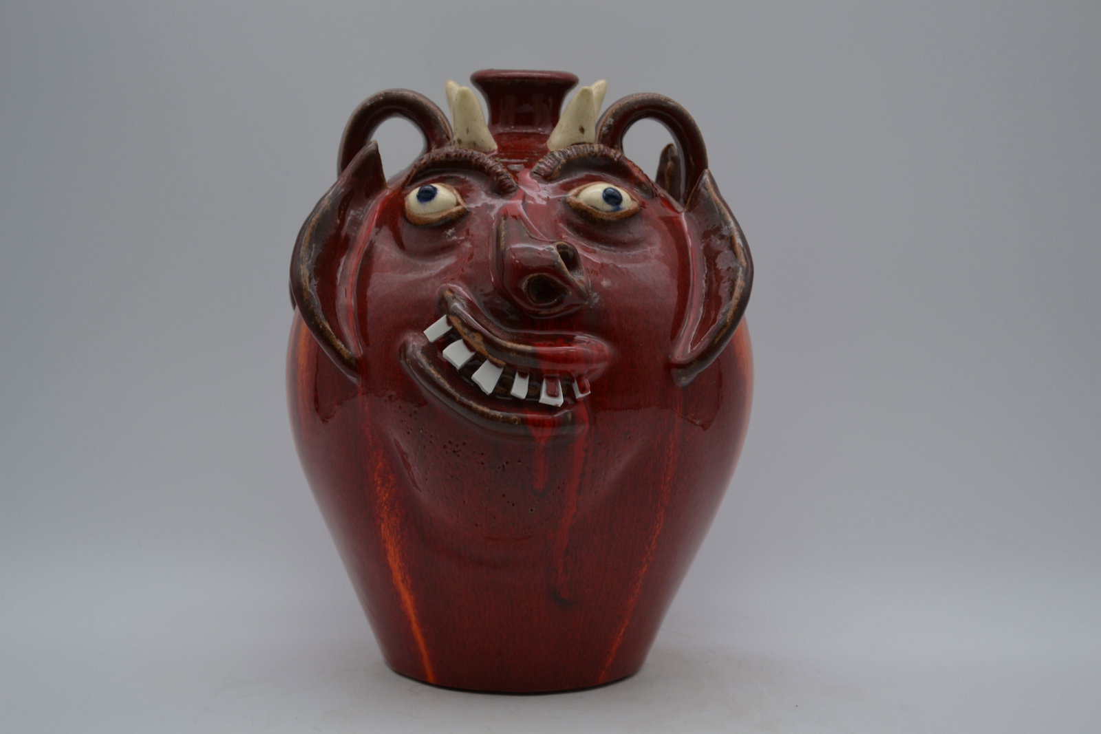 A.V. Smith Double Devil Face Jug - 2