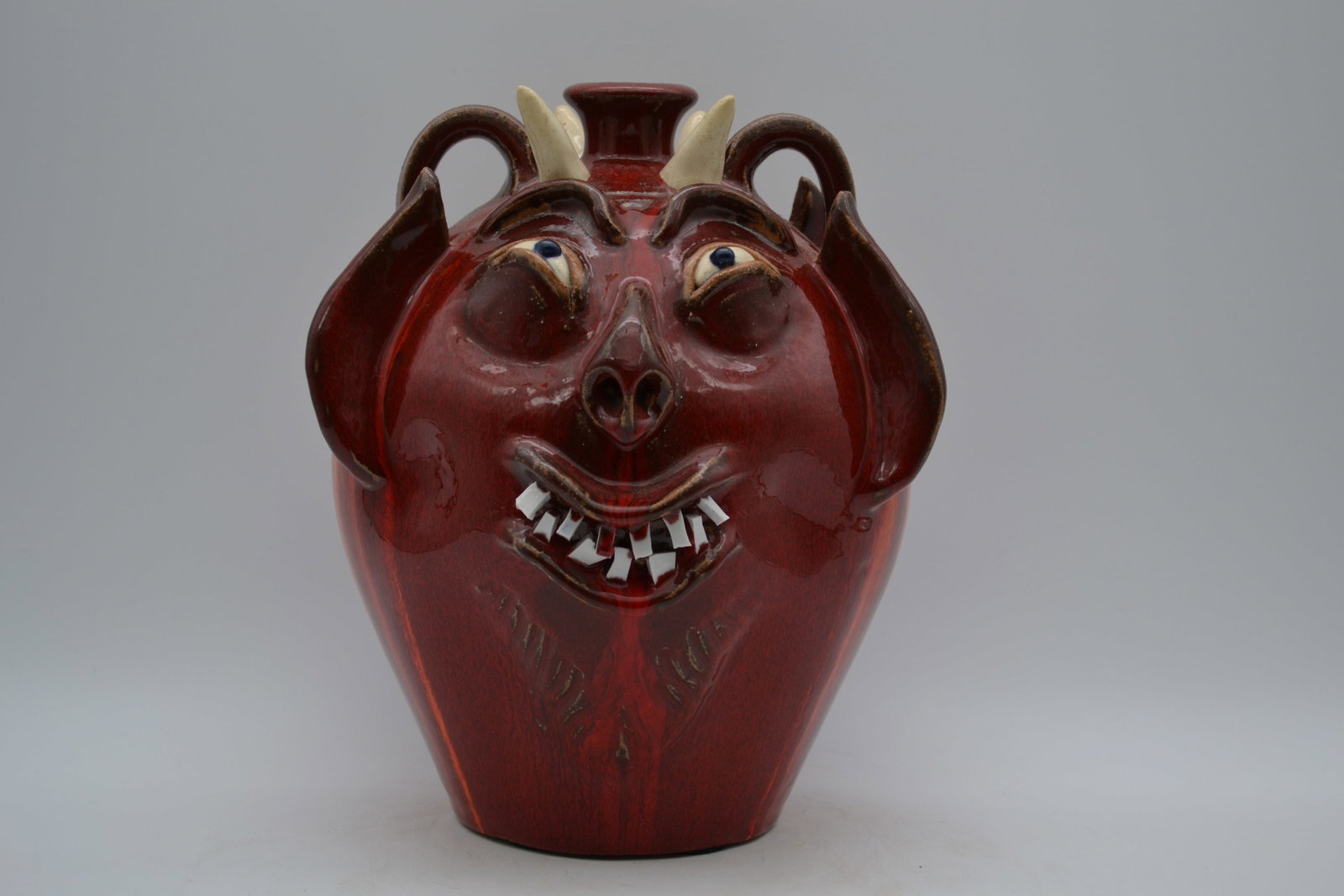 A.V. Smith Double Devil Face Jug - 4