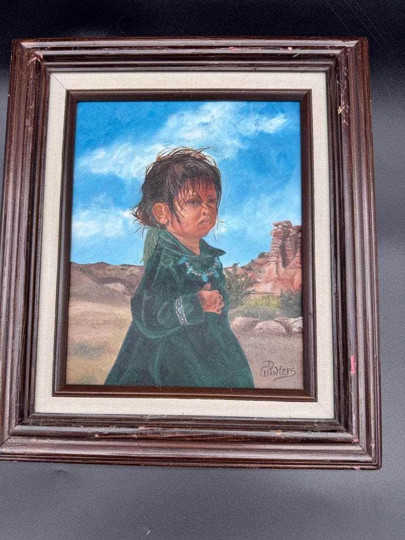 Native American Child Portrait Oil Painting: This bright portrait is an oil painting depicting “Navajo Little One” featuring a portrait of a Native American Child. This painting is signed by the artist D. Winters. This piece may show