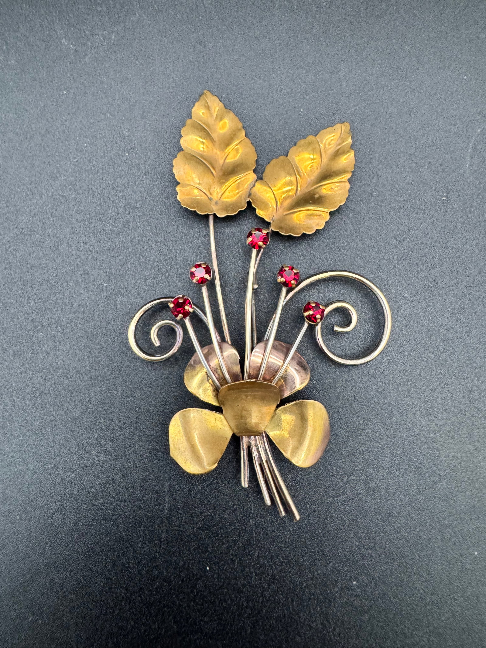 Lovely Vintage Antique Brooch: This unique vintage gold filled brooch featuring gorgeous red stones is a must for any vintage or unique gift enthusiast. Well kept for many years, a lovely statement piece for any outfit.