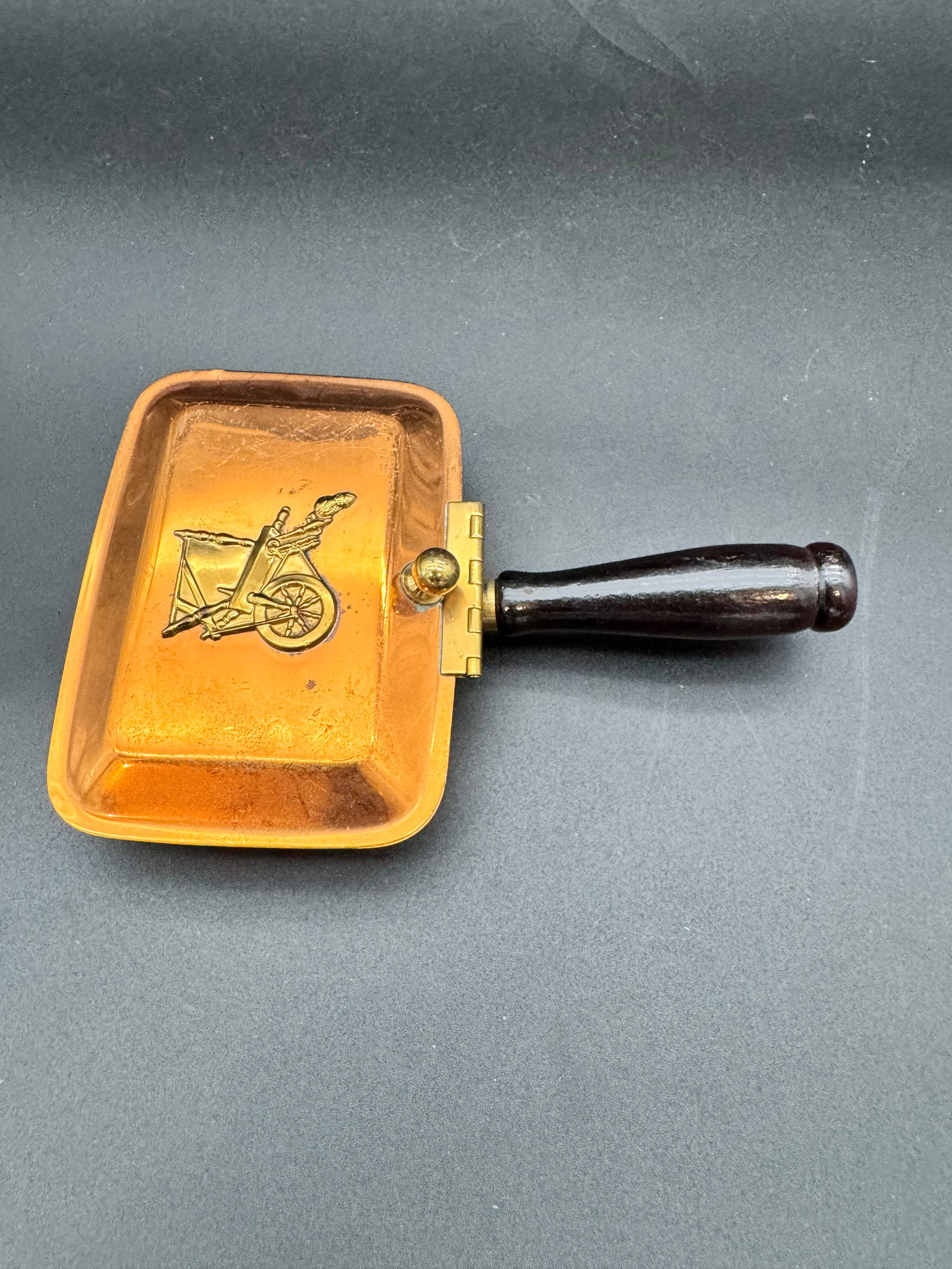 Copper and Wood Silent Butlers Crumb Tray: Mini silent butler with spinning wheel emblem. Vintage and well kept, made of copper and wood